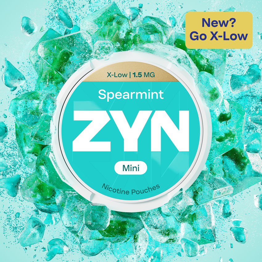 A real ZYN Mini Spearmint can from the official ZYN shop, showing X-Low and 1.5 MG on the lid.